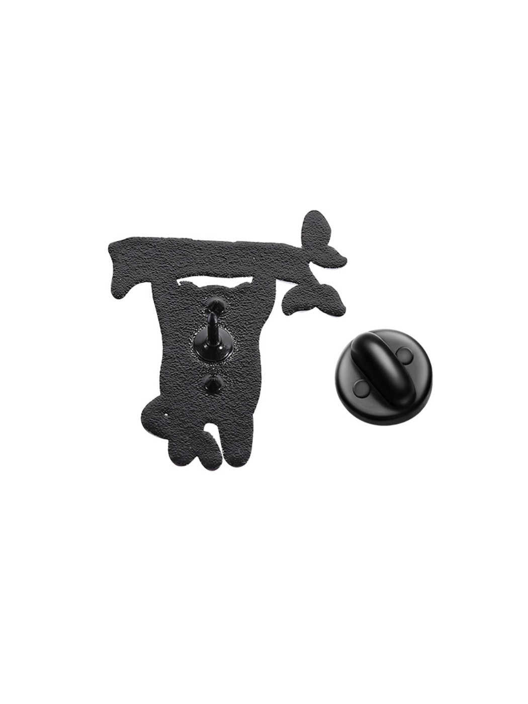 Pinori minimalist cat brooch next to a ruler showing size and scale