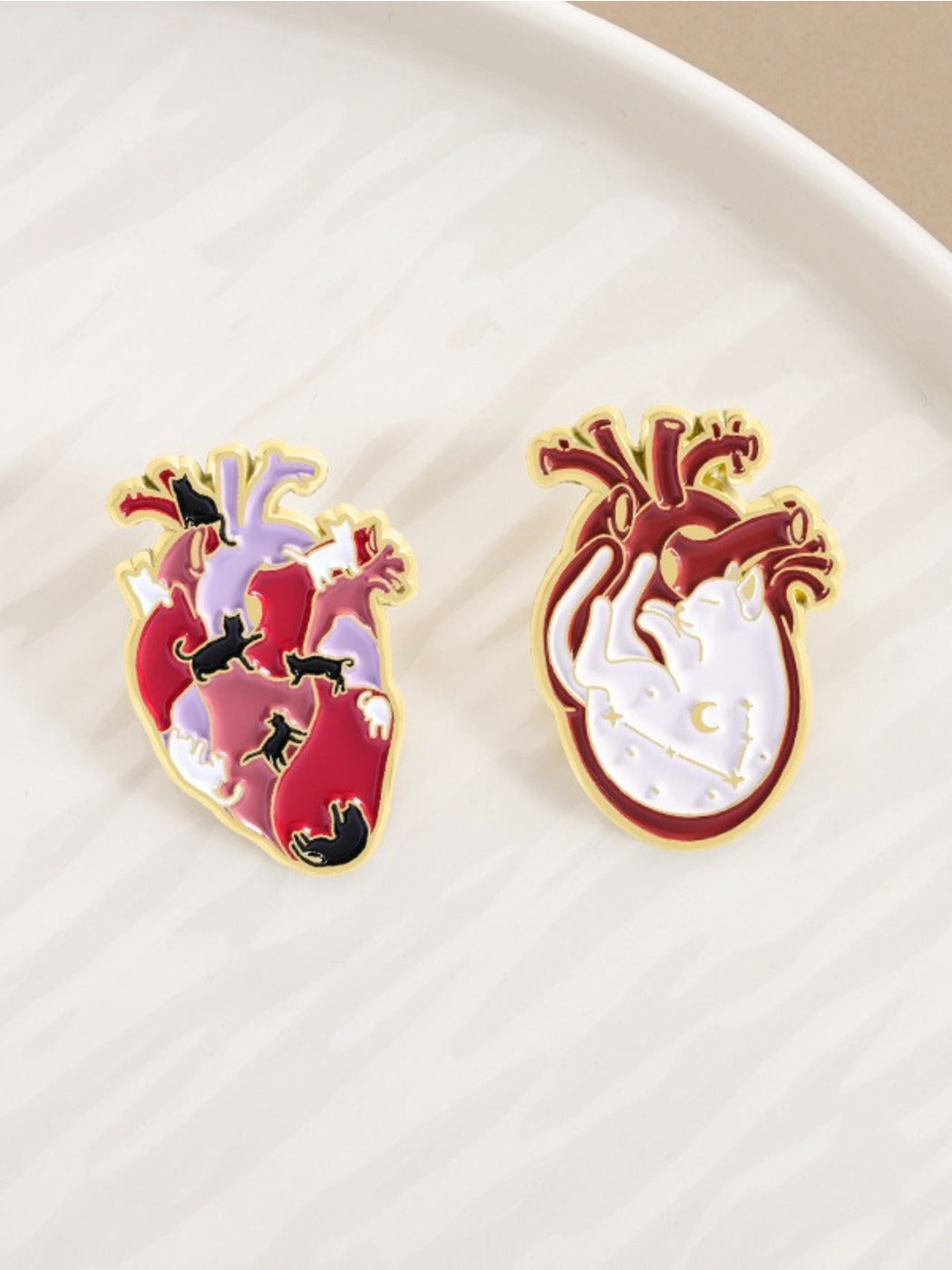 Pinori cat heart anatomy brooch showing detailed heart design on cat silhouette