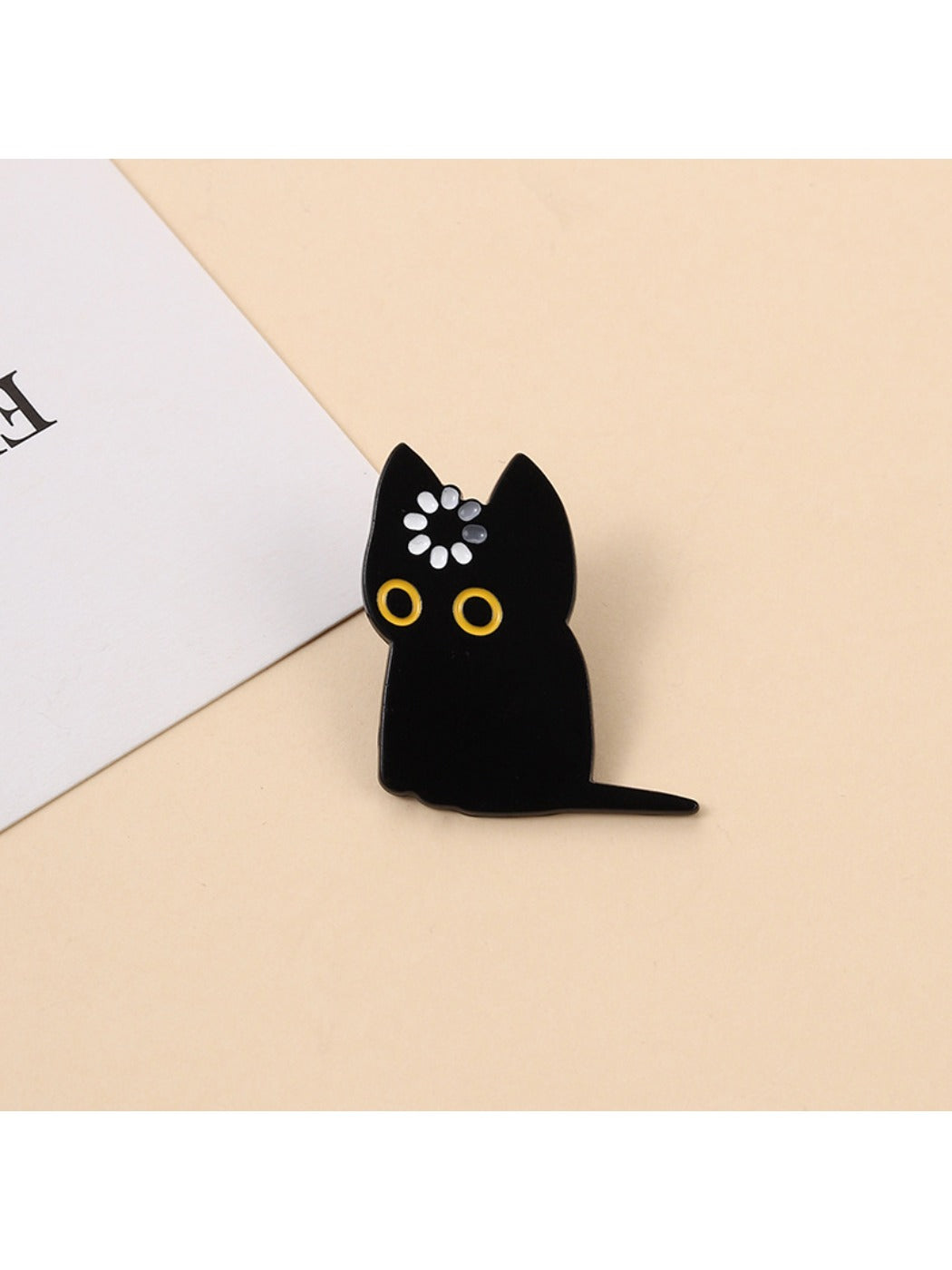 Pinori cute cartoon black cat brooch with green eyes on white background