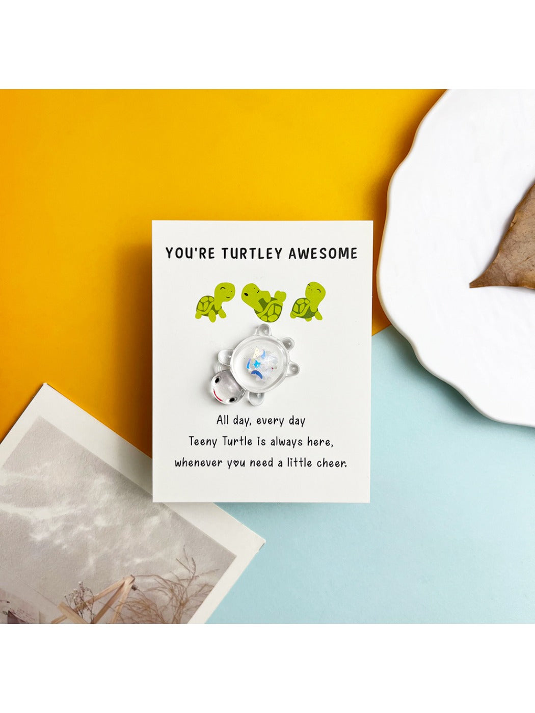 Taphug Glitter Turtle Pocket Hug Card with glitter sparkling under light