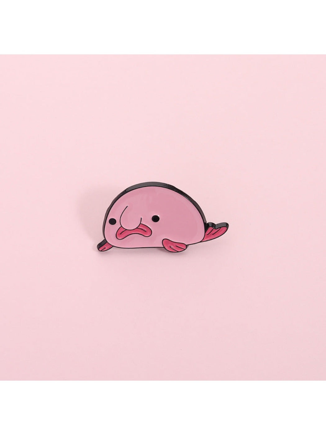 Close-up of Pinori Sad Pink Blobfish Brooch highlighting its facial expression