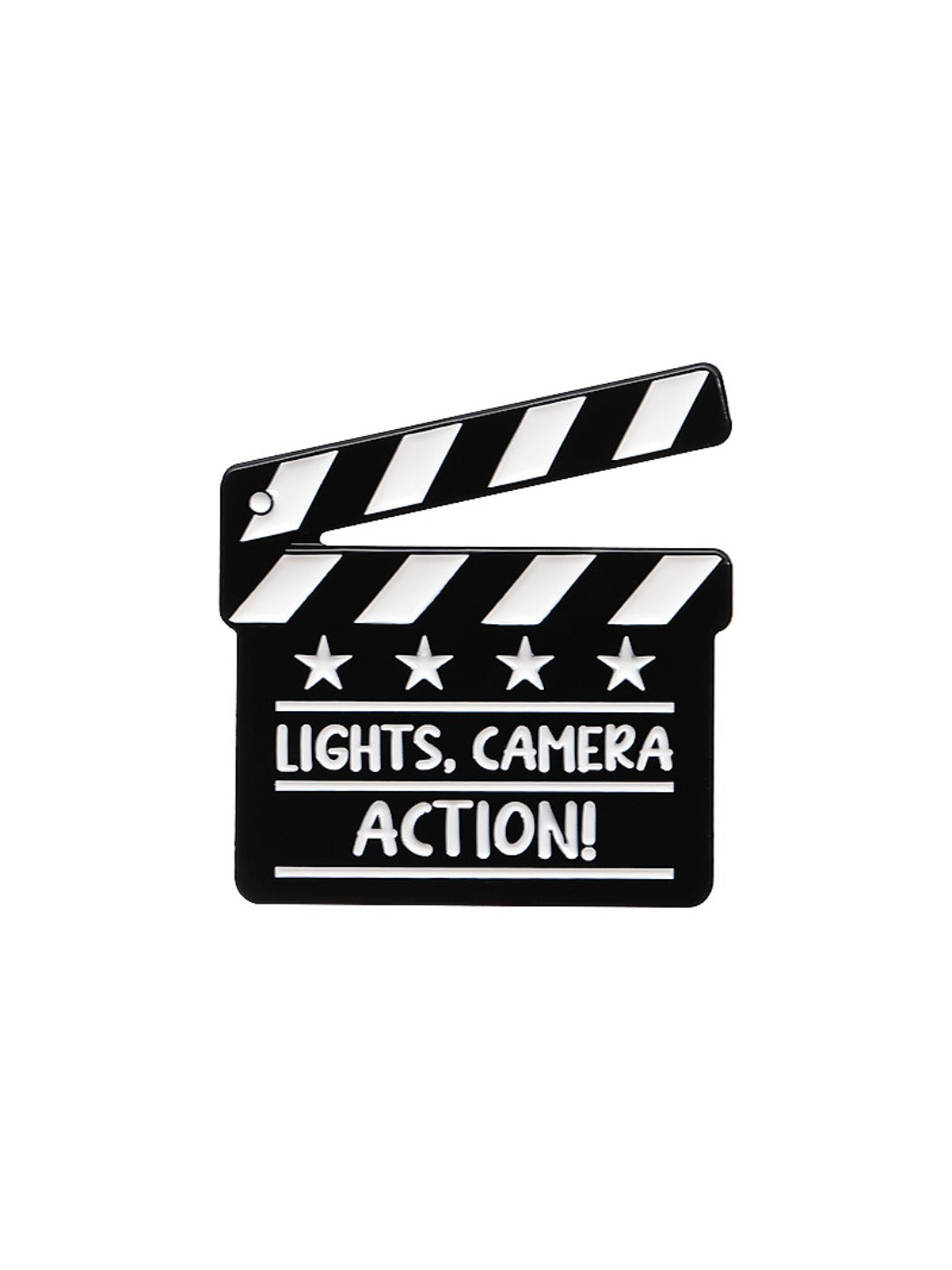 Pinori clapperboard brooch photographed with soft natural lighting