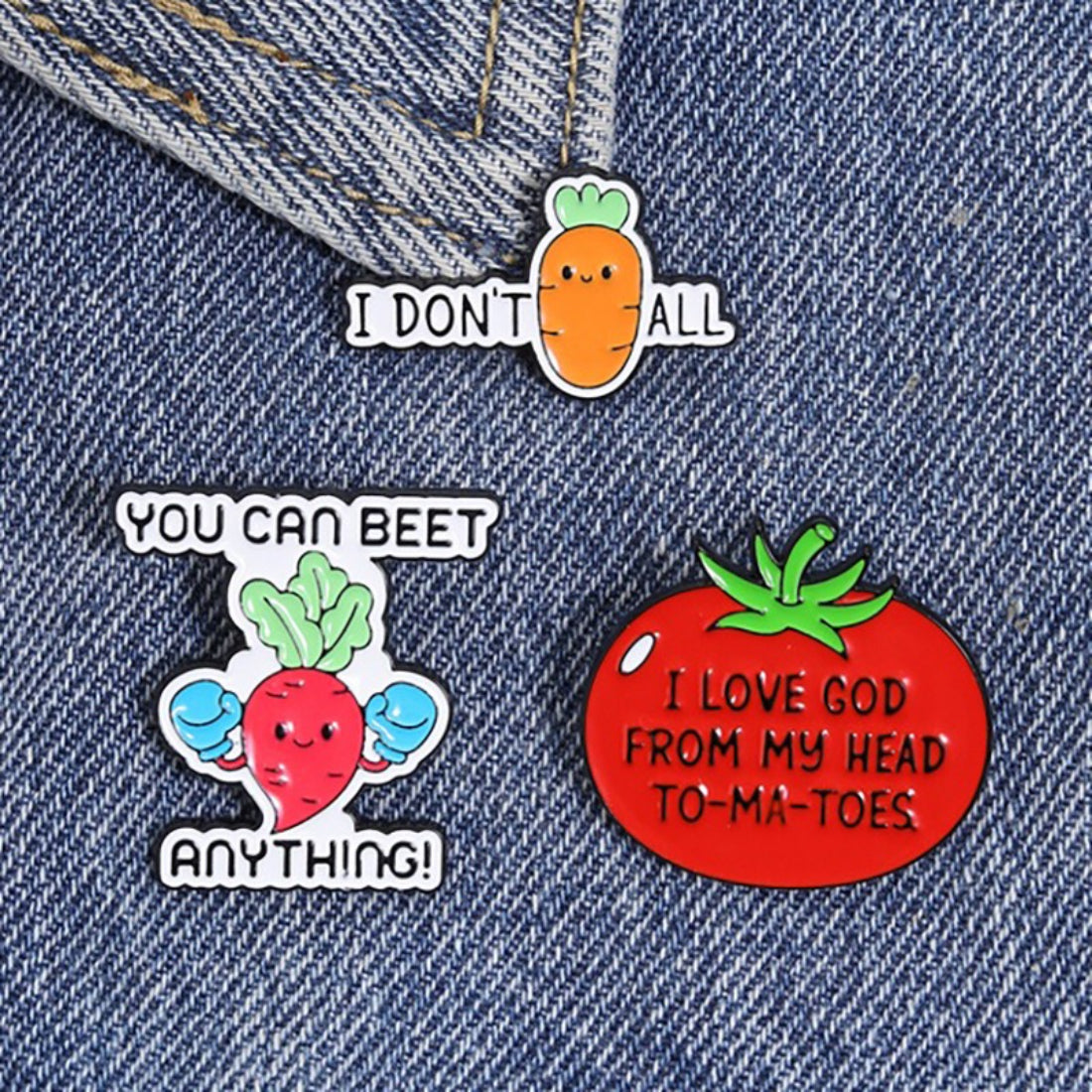 Pinori enamel pin held between fingers showing size and detail
