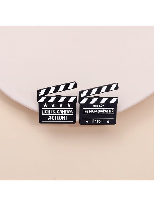 Pinori funny TV series clapperboard brooch on white background