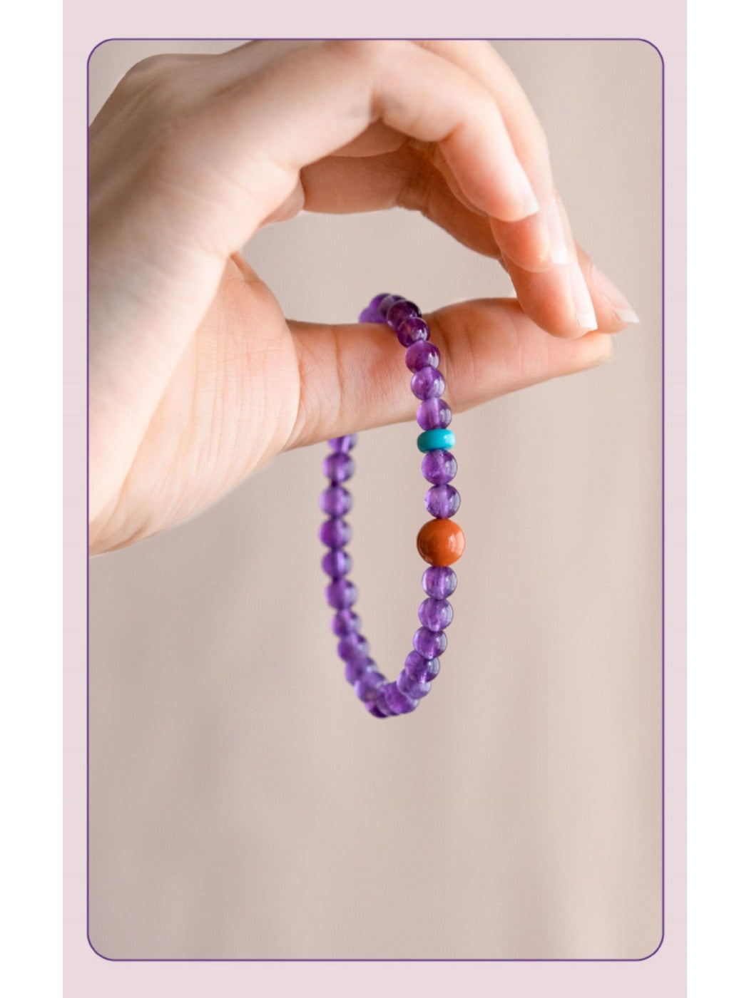 Top view of Emora purple beaded bracelet with amethyst stones arranged in a circle