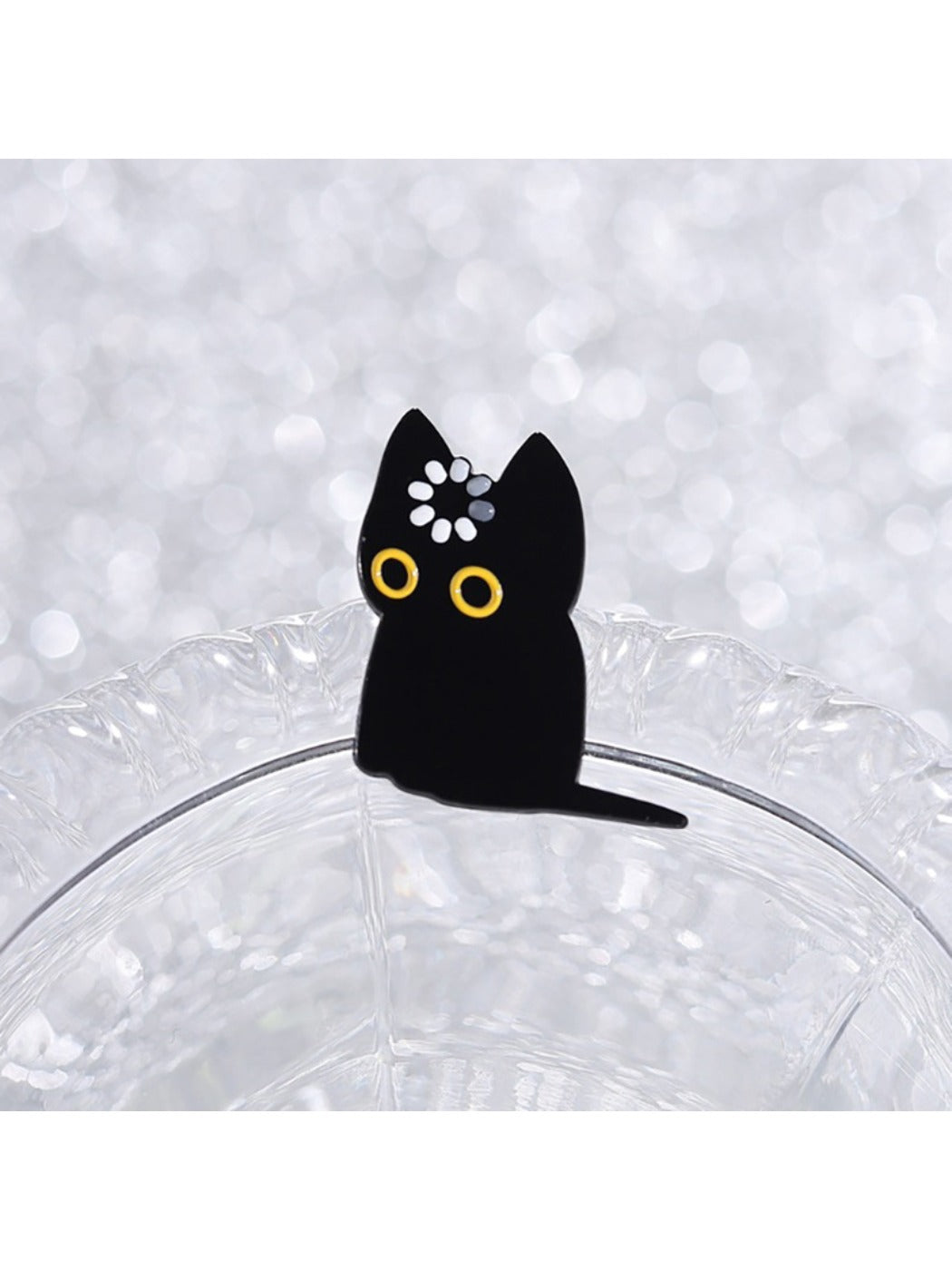 Close-up of Pinori black cat brooch showing detailed enamel finish