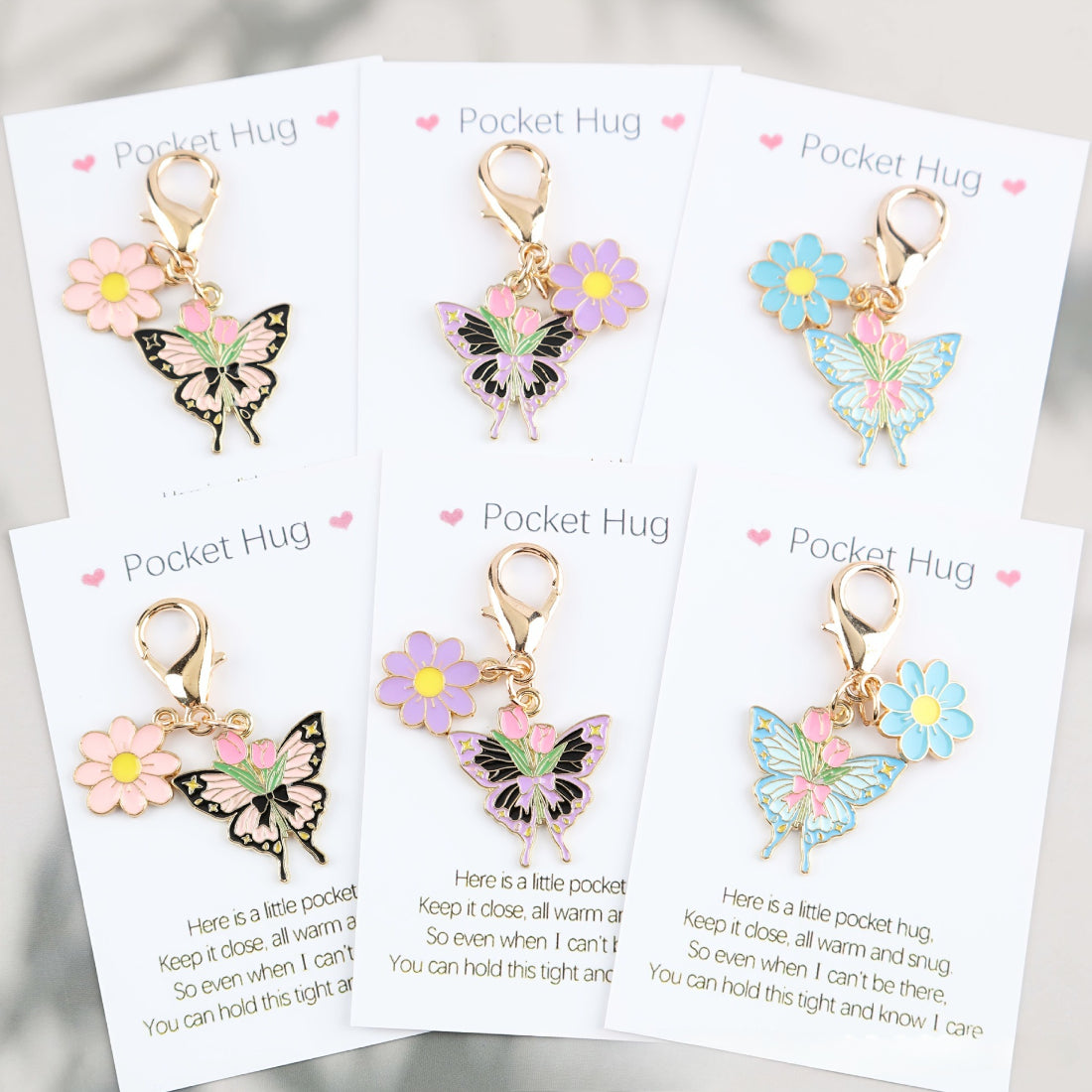 Taphug Floral Butterfly Charm Pocket Hug in a small gift box with floral design