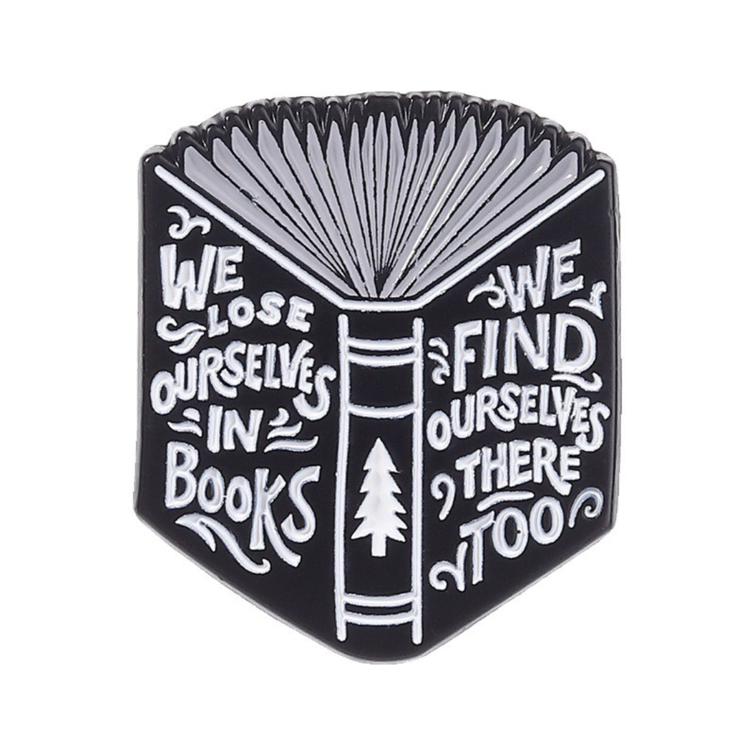 Pinori Book Lover enamel pin resting on a wooden surface with soft lighting