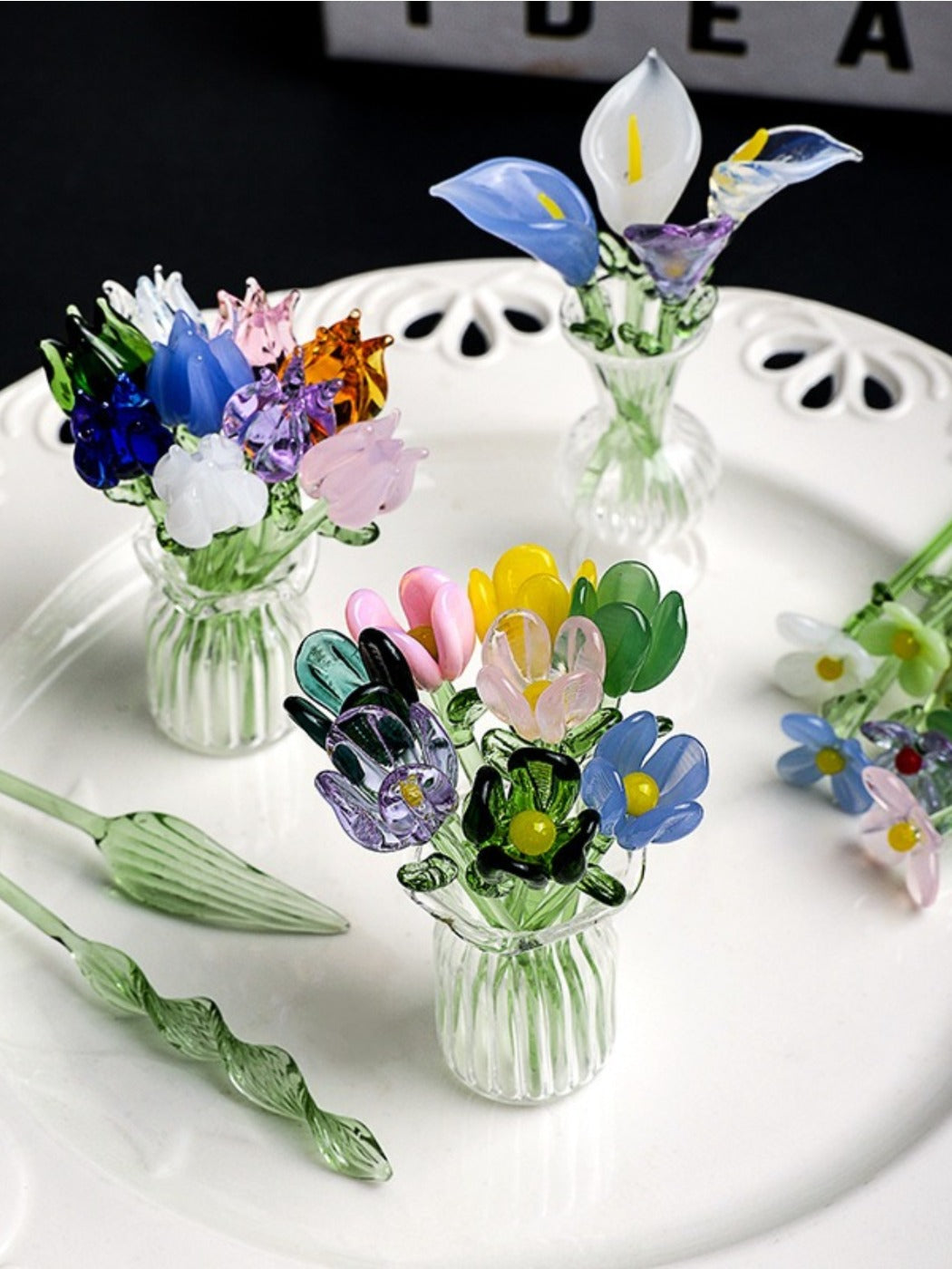 Close-up of Thimara Japanese mini glass flowers showing delicate petals and stems