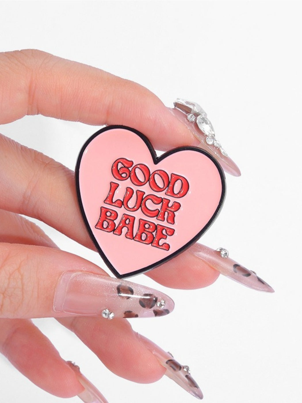 Side view of Pinori stylish love heart pin with vibrant wind colors