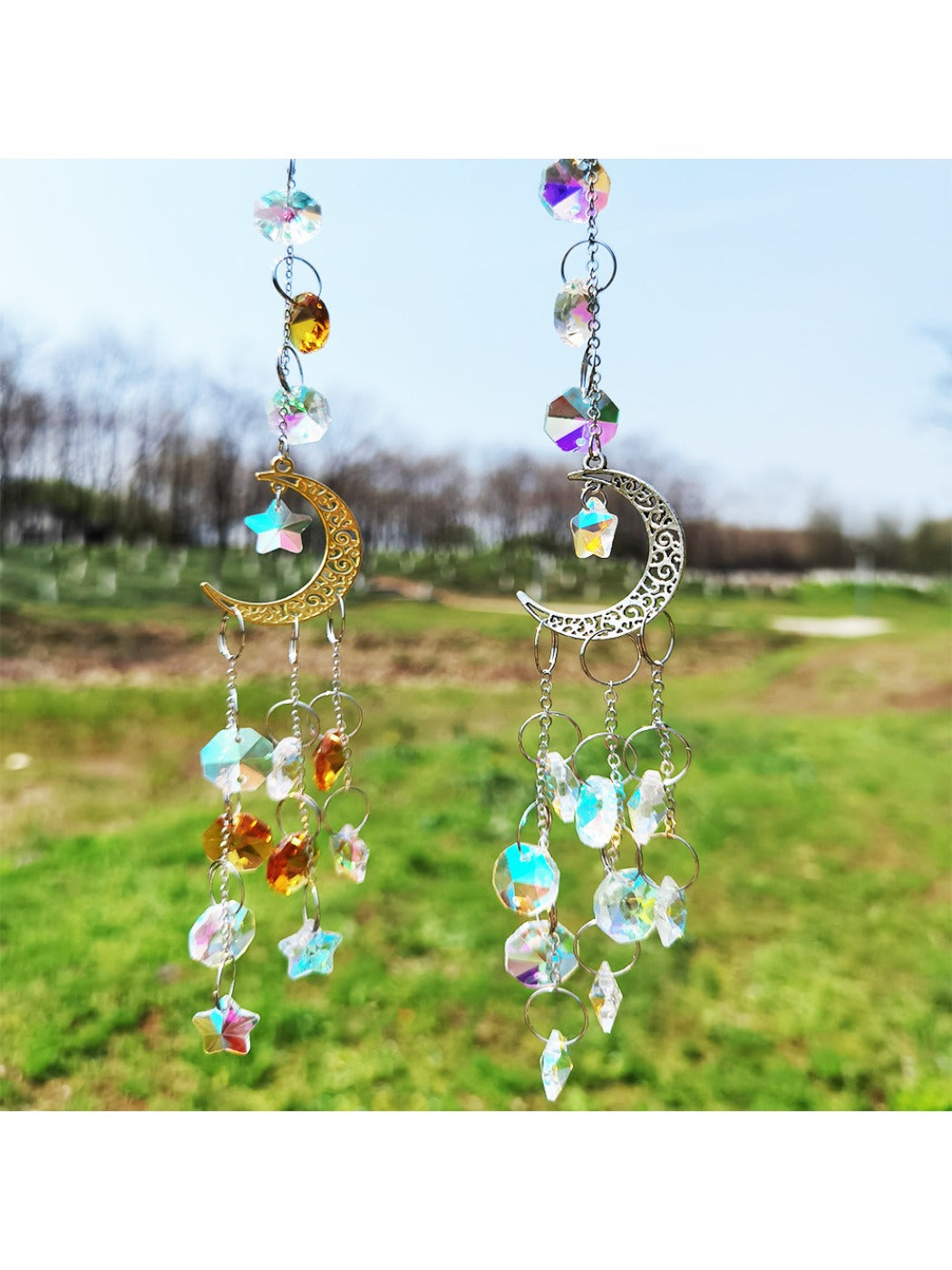 Dream catcher hanging against a white wall showing full design and feathers