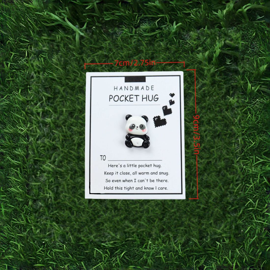 Taphug Little Panda Pocket Hug held in hand to show compact size and softness