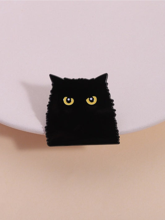 Close-up of Pinori gothic black cat shadow metal brooch on white background