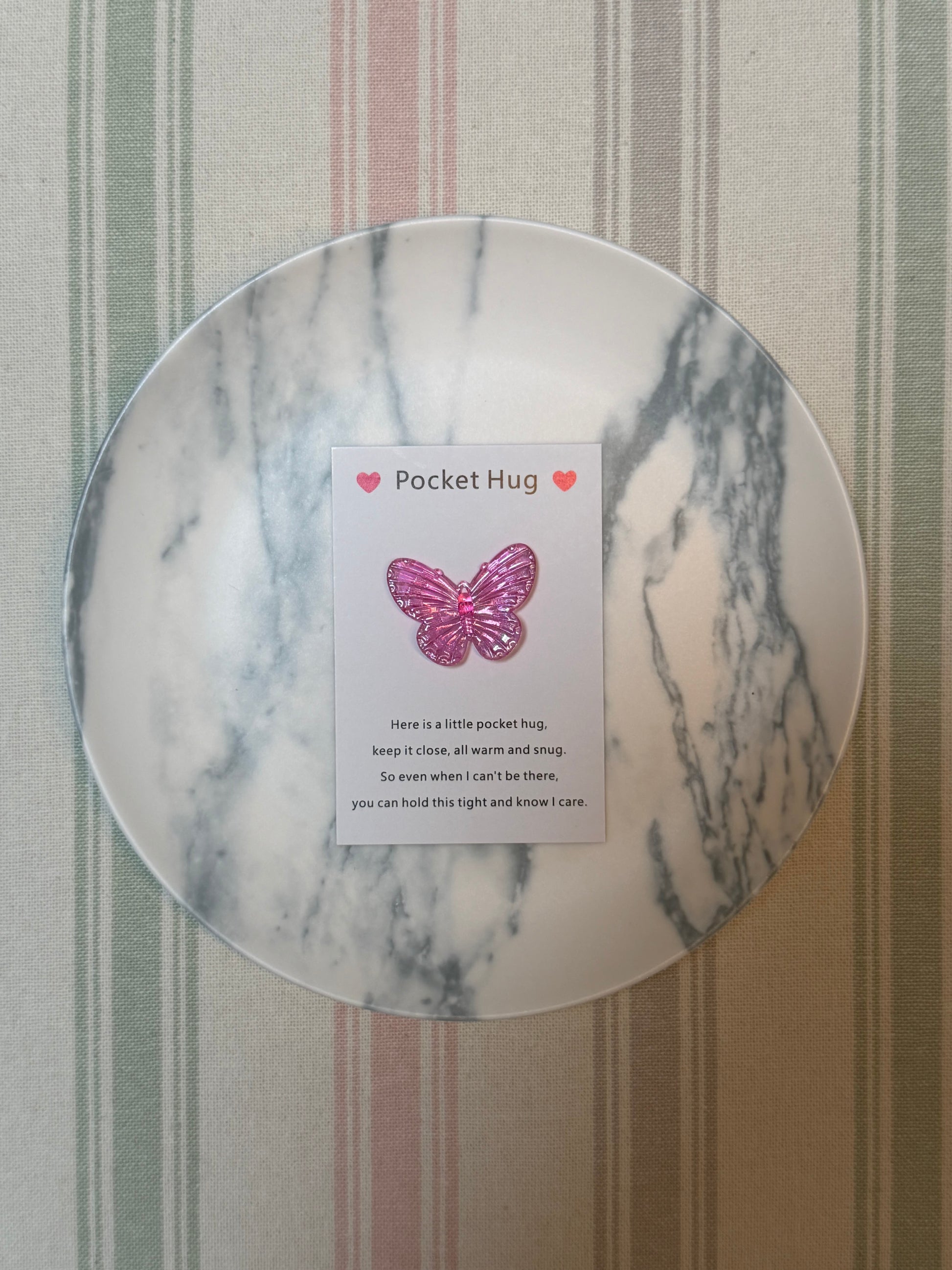 Pocket-sized card partially open showing space for a short note or small photo