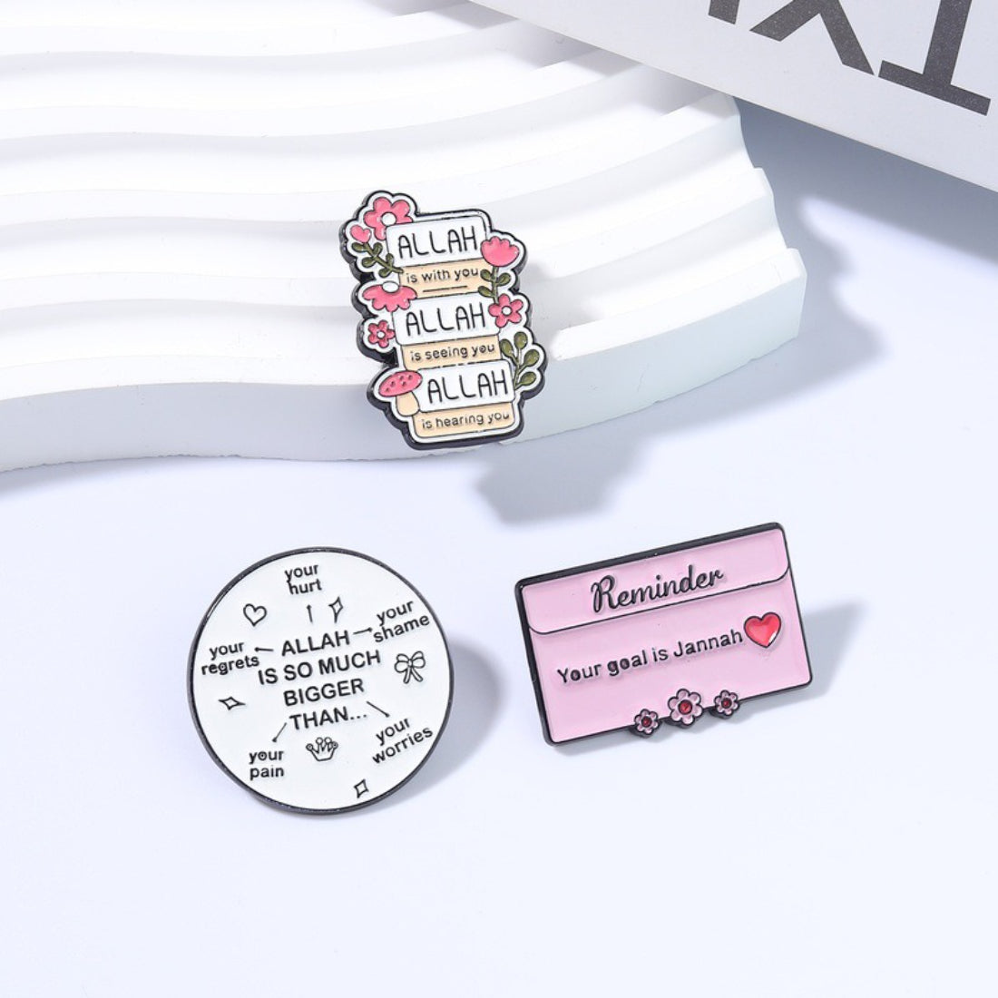 Close-up of Pinori Comfort Quote enamel pin showing detailed text and design