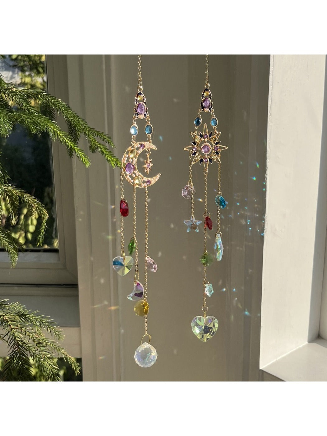 Full view of Somnira Iridescent Sun Dream Catcher hanging against a white background