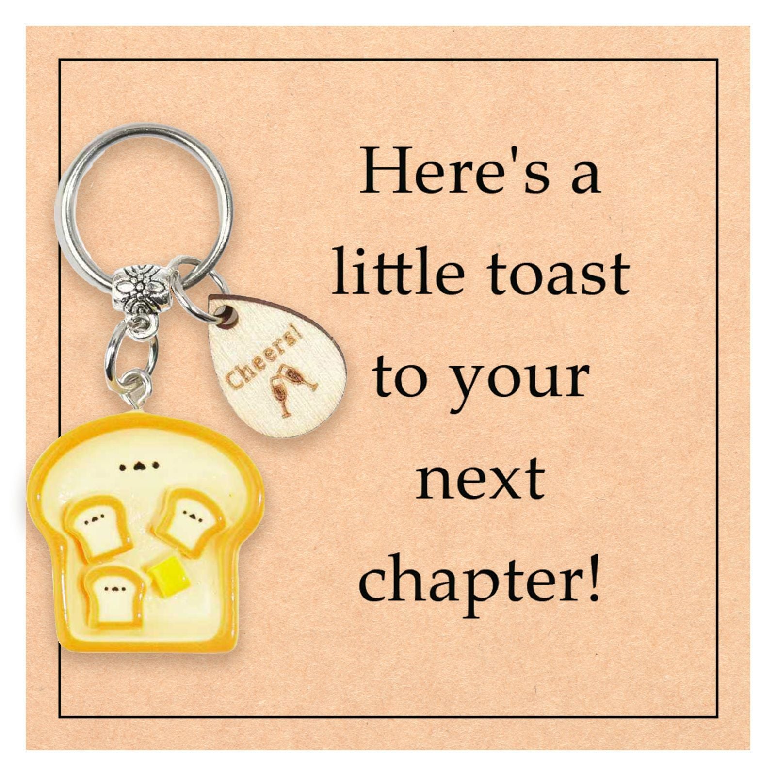 Taphug cute bread cartoon keychain displayed on a plain surface with keyring