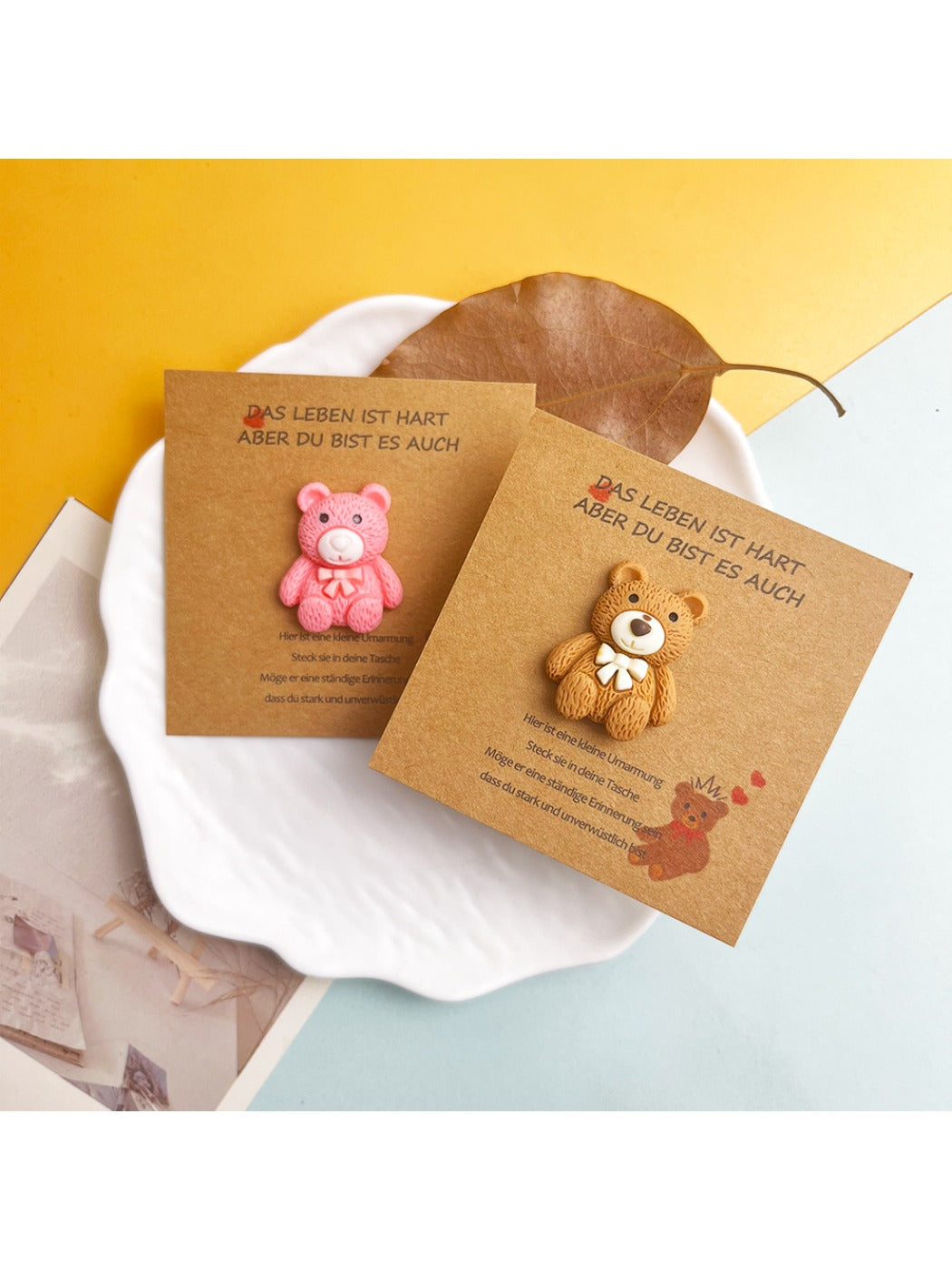Close-up of the bear pocket hug detail on the Taphug DIY card showing soft textures