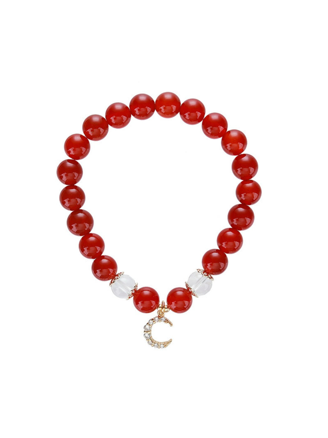 Emora red agate bracelet arranged with gift wrapping materials
