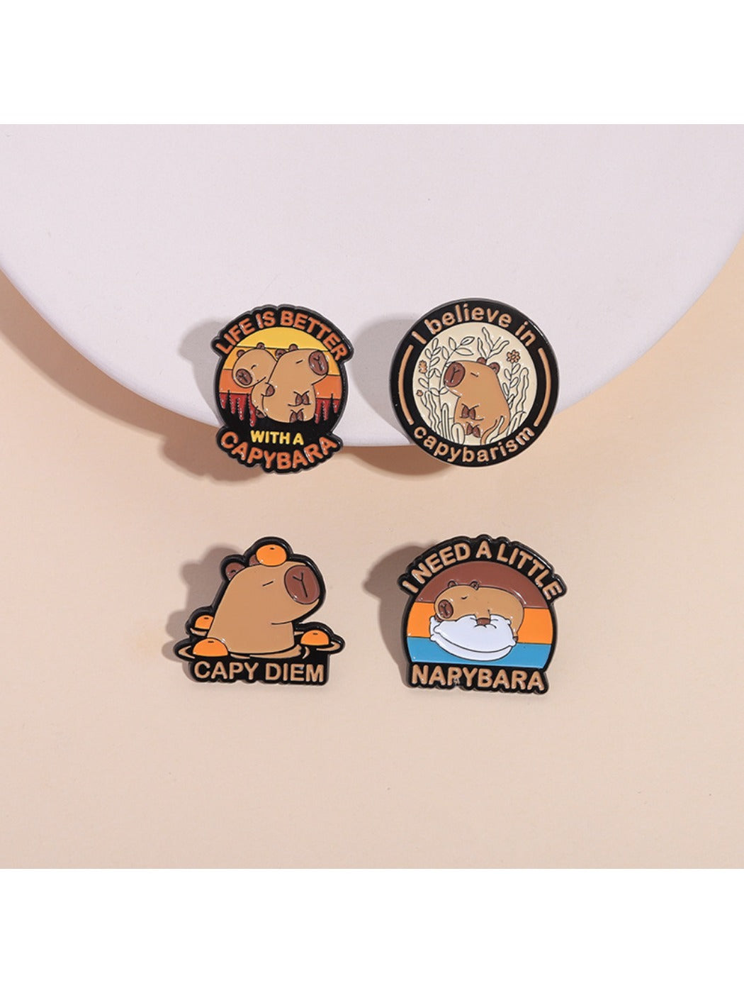 Pinori capybara metal enamel pin on white background showing front view