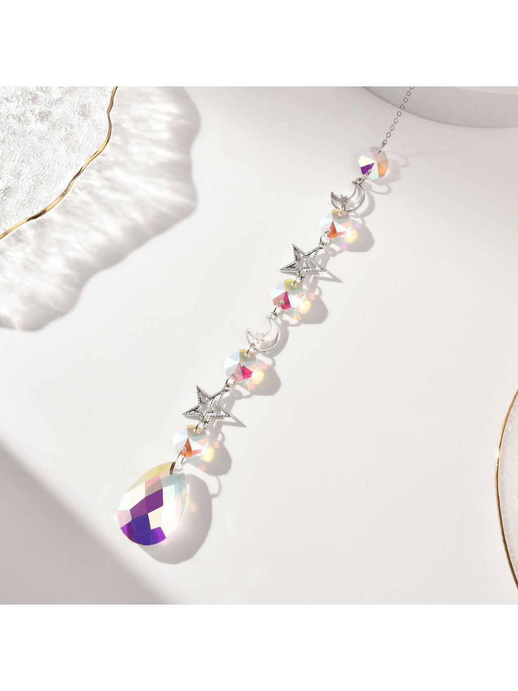 Close-up of Somnira dream catcher showing intricate crystal details and webbing