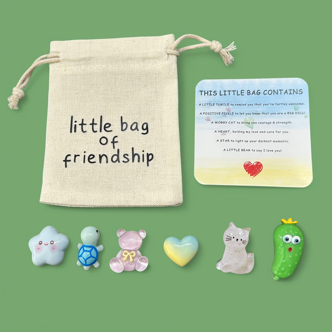 Taphug Friendship Pocket Hug contents including card and small bag on a white background