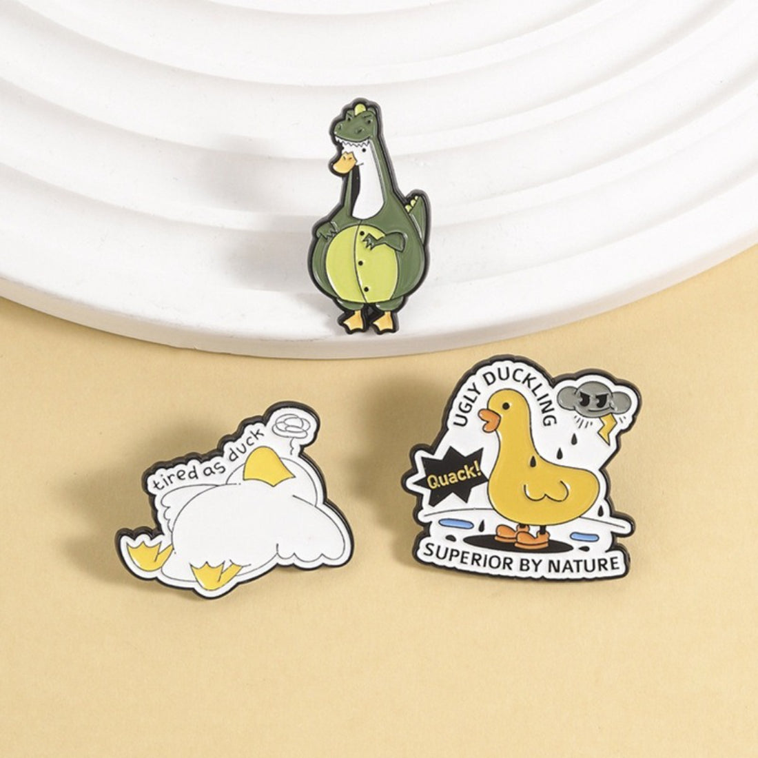 Pinori playful character enamel pin with colorful cartoon design on white background