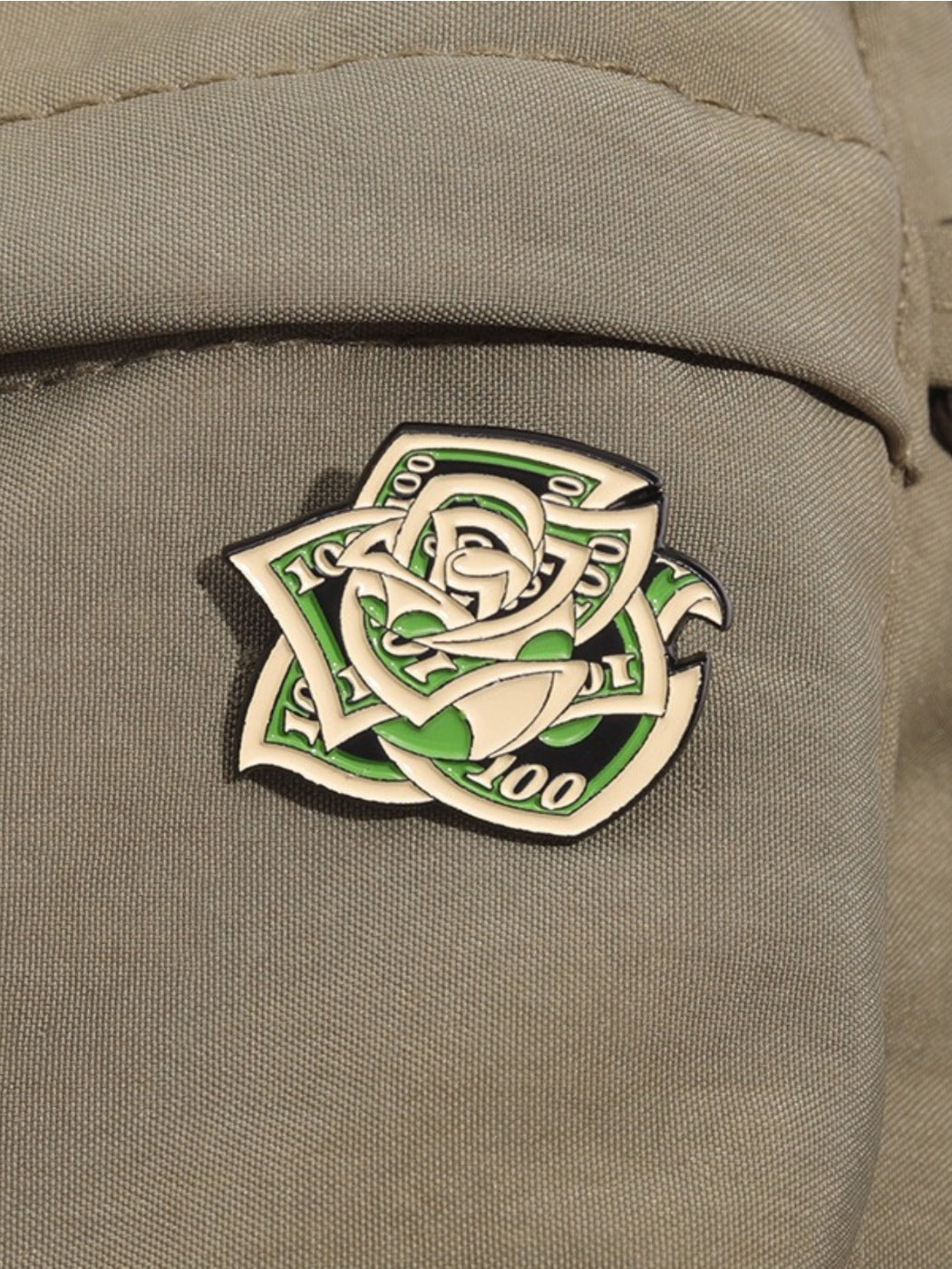 Pinori brooch worn on a jacket lapel showcasing size and floral design