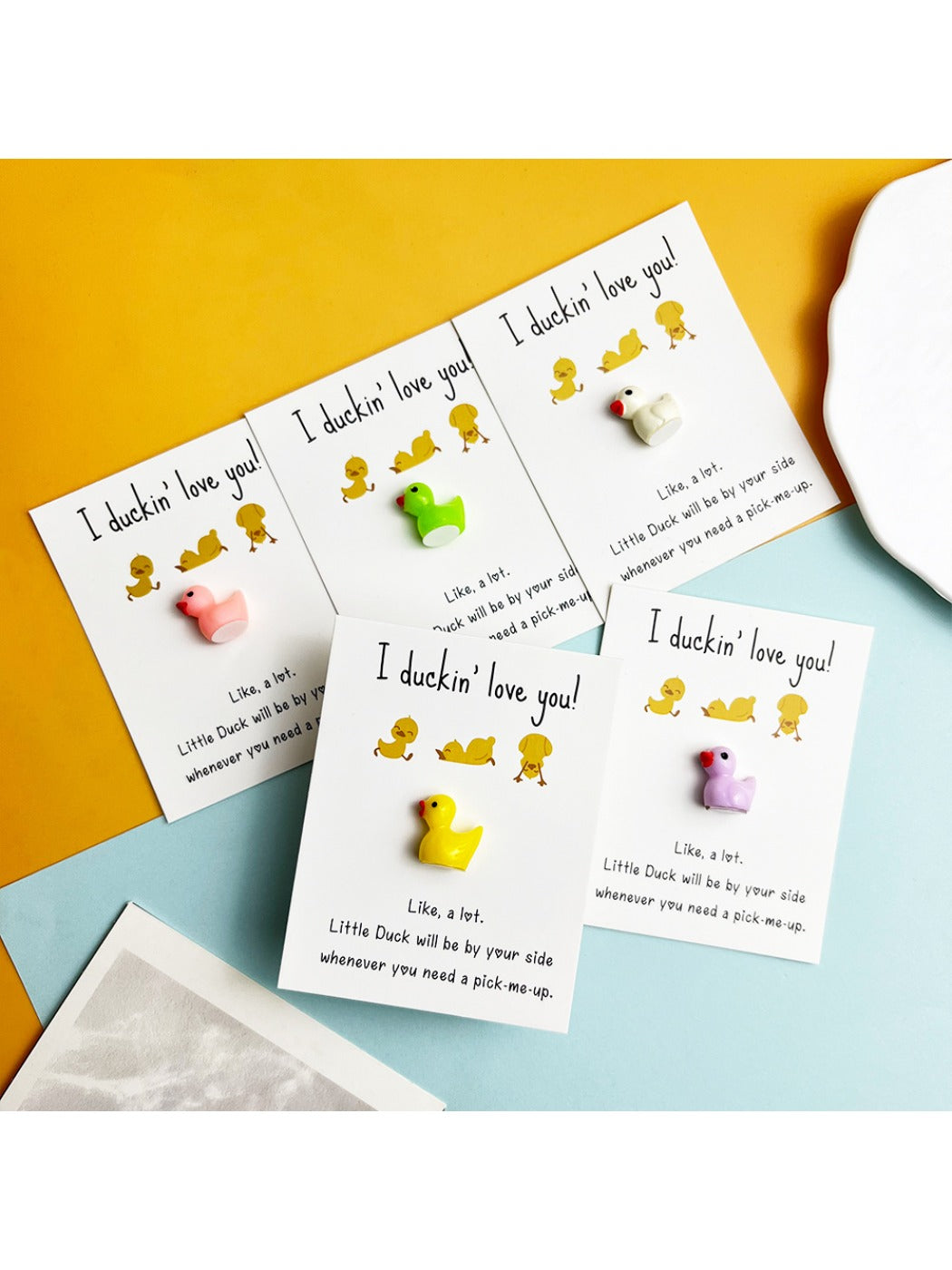 Taphug DIY resin duck pocket hug card with a small yellow duck inside a clear resin case