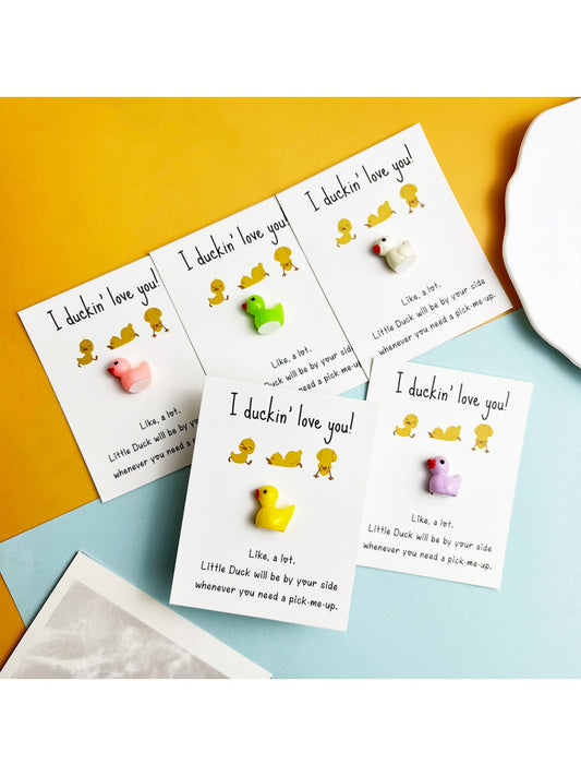 Taphug DIY resin duck pocket hug card with a small yellow duck inside a clear resin case