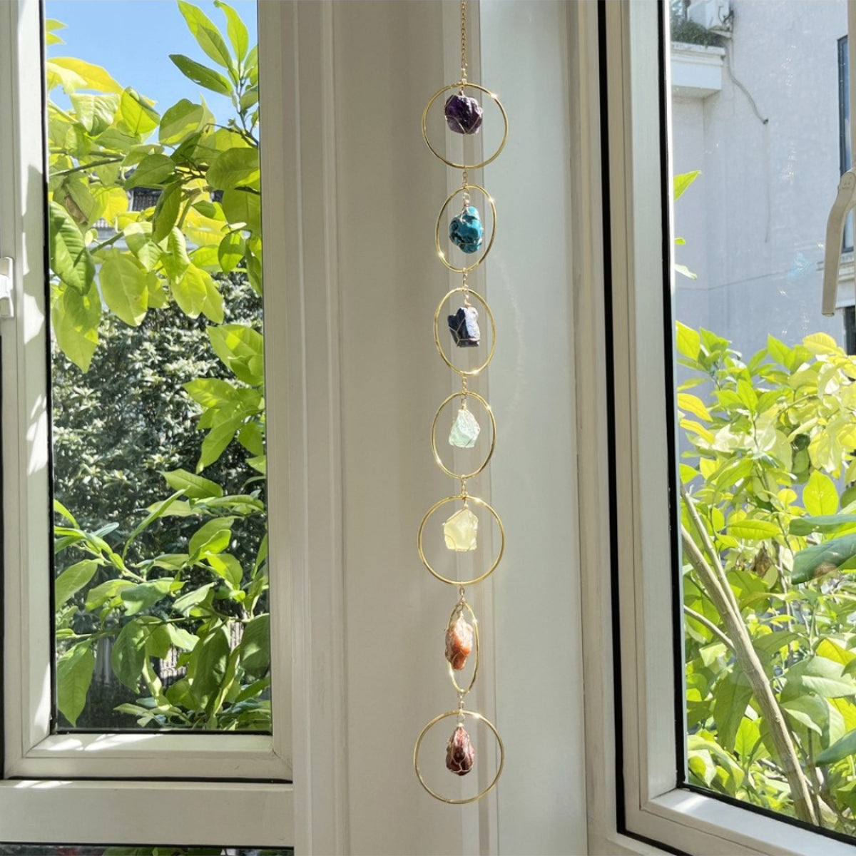 Somnira colorful stone ring suncatcher with multicolor drops and circular frames