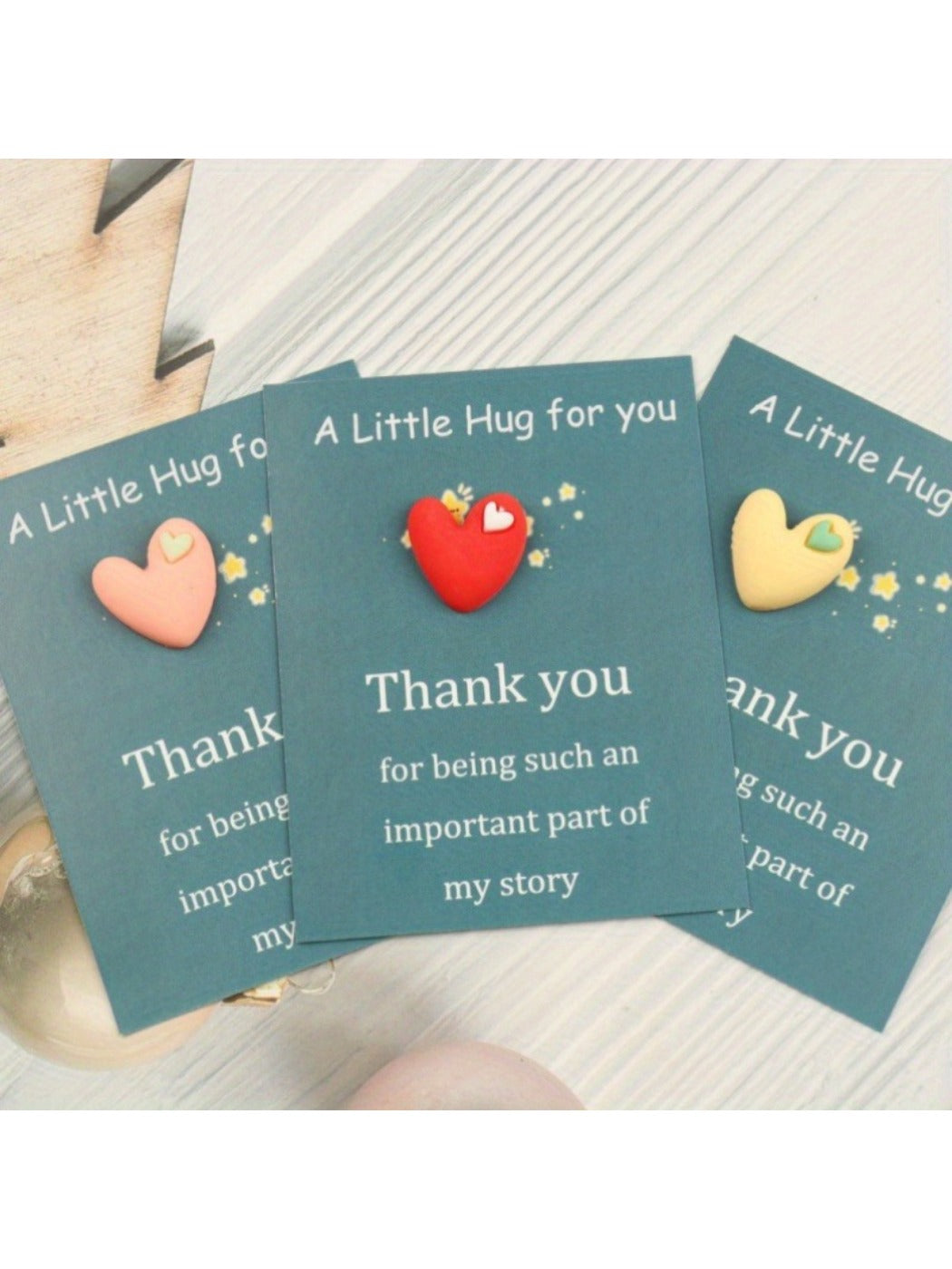Taphug Pocket Hug Star in random color displayed on white background