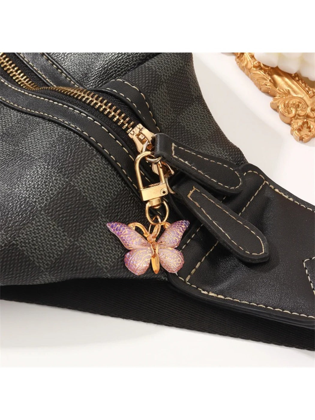 Taphug gradient color butterfly keychain shown against a neutral background