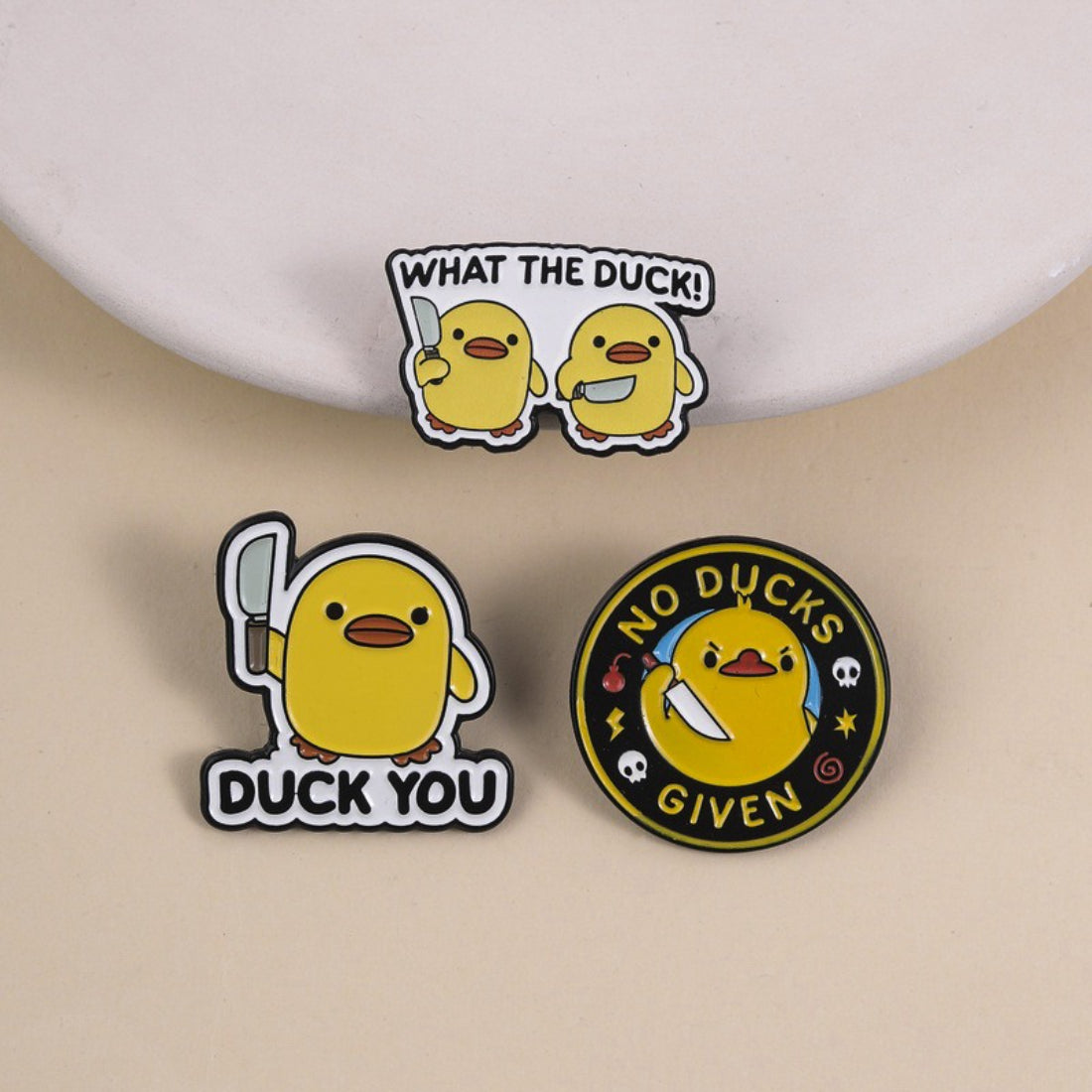 Pinori funny duck enamel pin with yellow duck and orange beak on white background