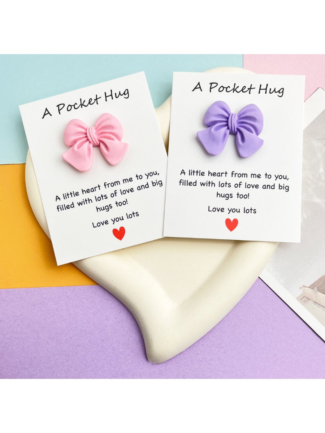 Taphug Pocket Hug card with bow placed on a flat surface