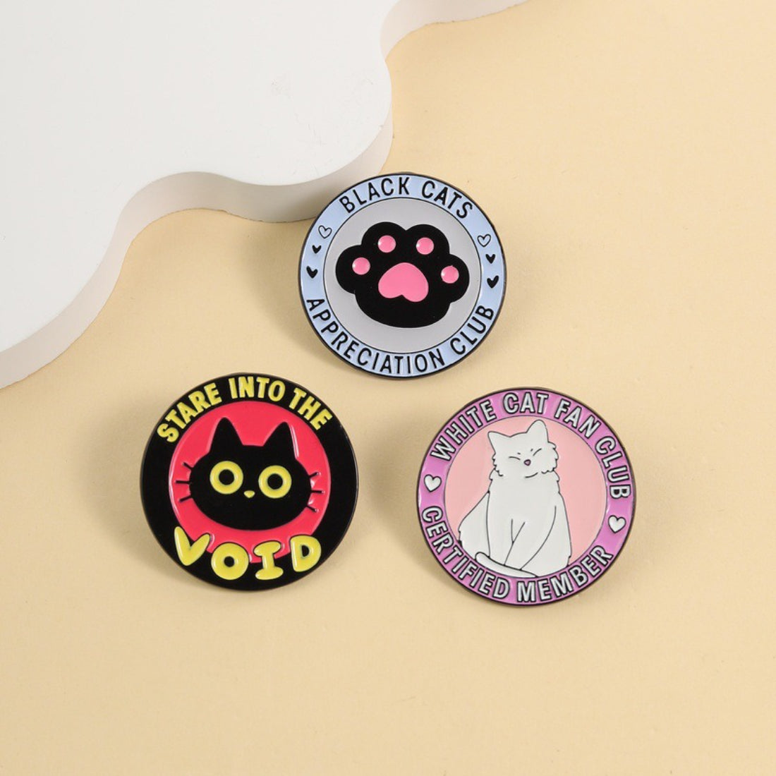 Pinori Cat Fan Club enamel pin featuring a stylized cat face with whiskers and ears
