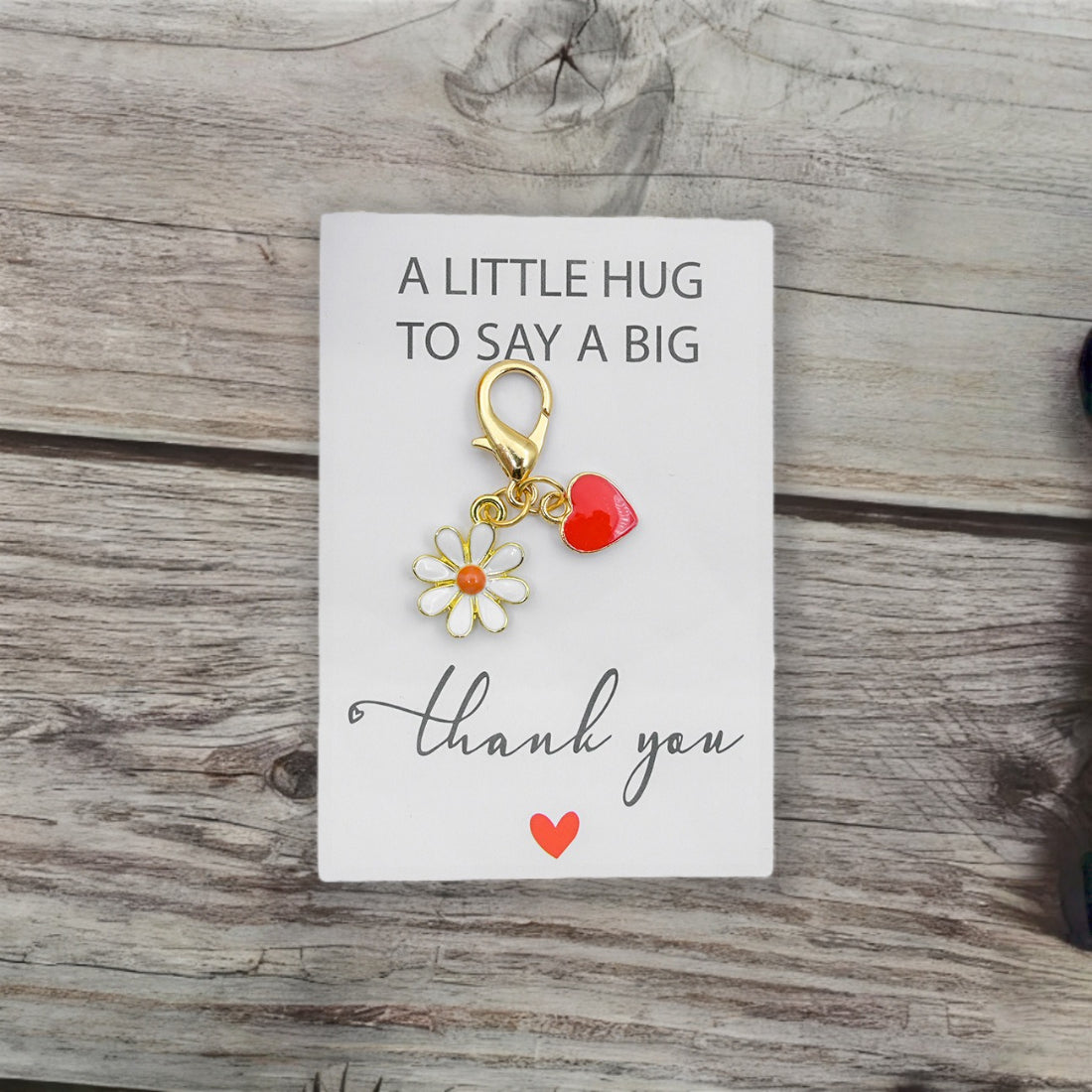 Hand holding the Thank You Daisy Pocket Hug card with visible daisy artwork