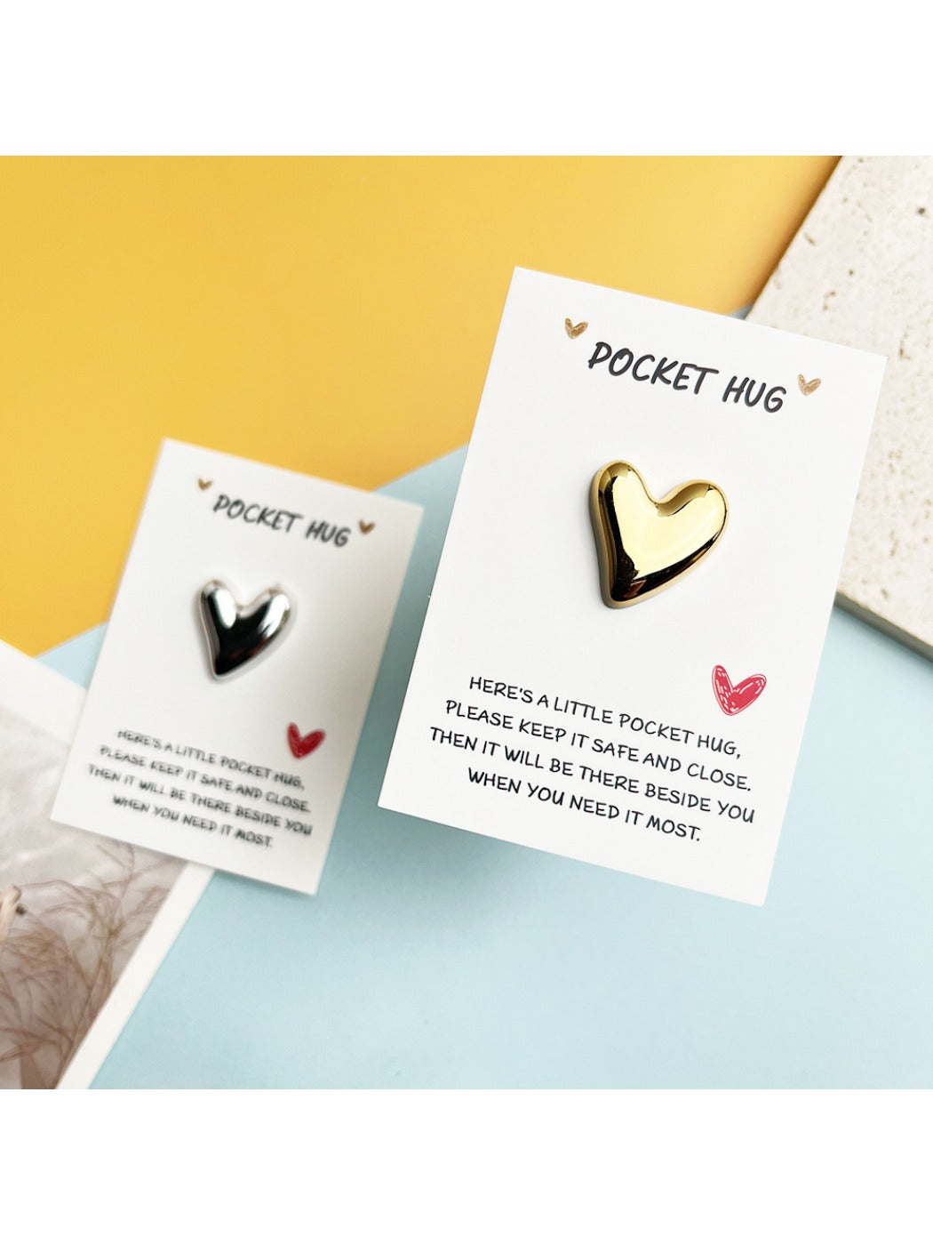 Taphug Pocket Hug shiny heart held in hand with visible love message