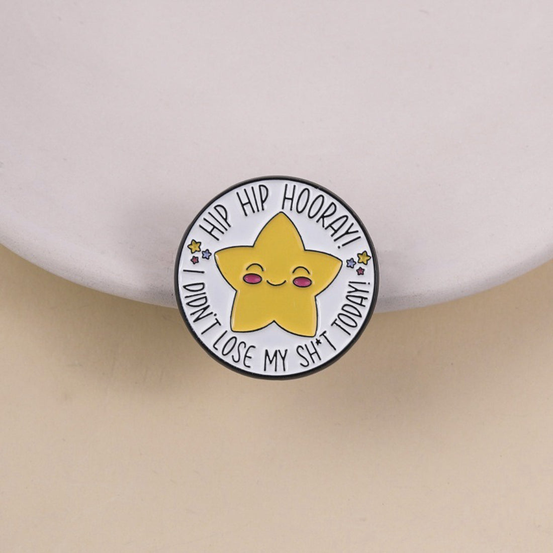 Pinori Hip Hip Hooray star-shaped enamel pin with gold outline on white background