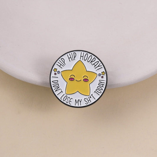 Pinori Hip Hip Hooray star-shaped enamel pin with gold outline on white background