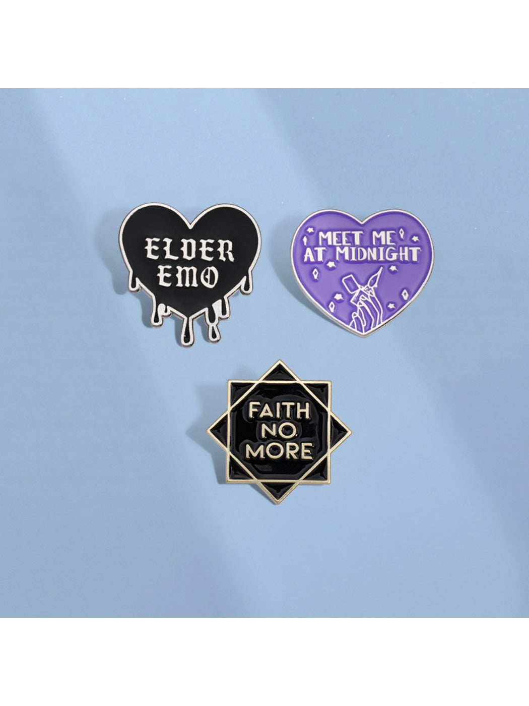 Pinori rock band badge featuring black heart and stylized letters on metal pin
