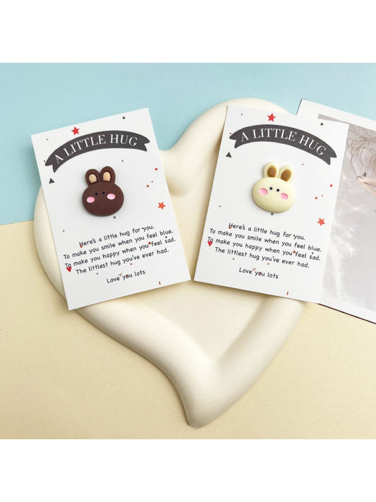 Taphug Pocket Hug featuring an adorable blushing rabbit plush toy