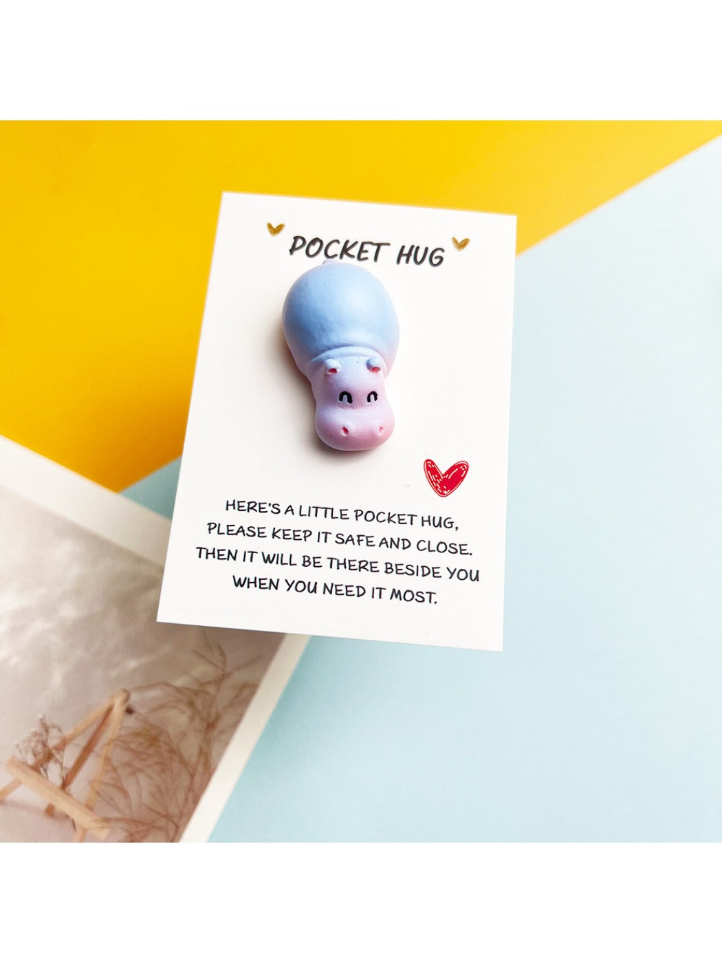 Taphug Pocket Hug cute hippo plush toy shown from side angle