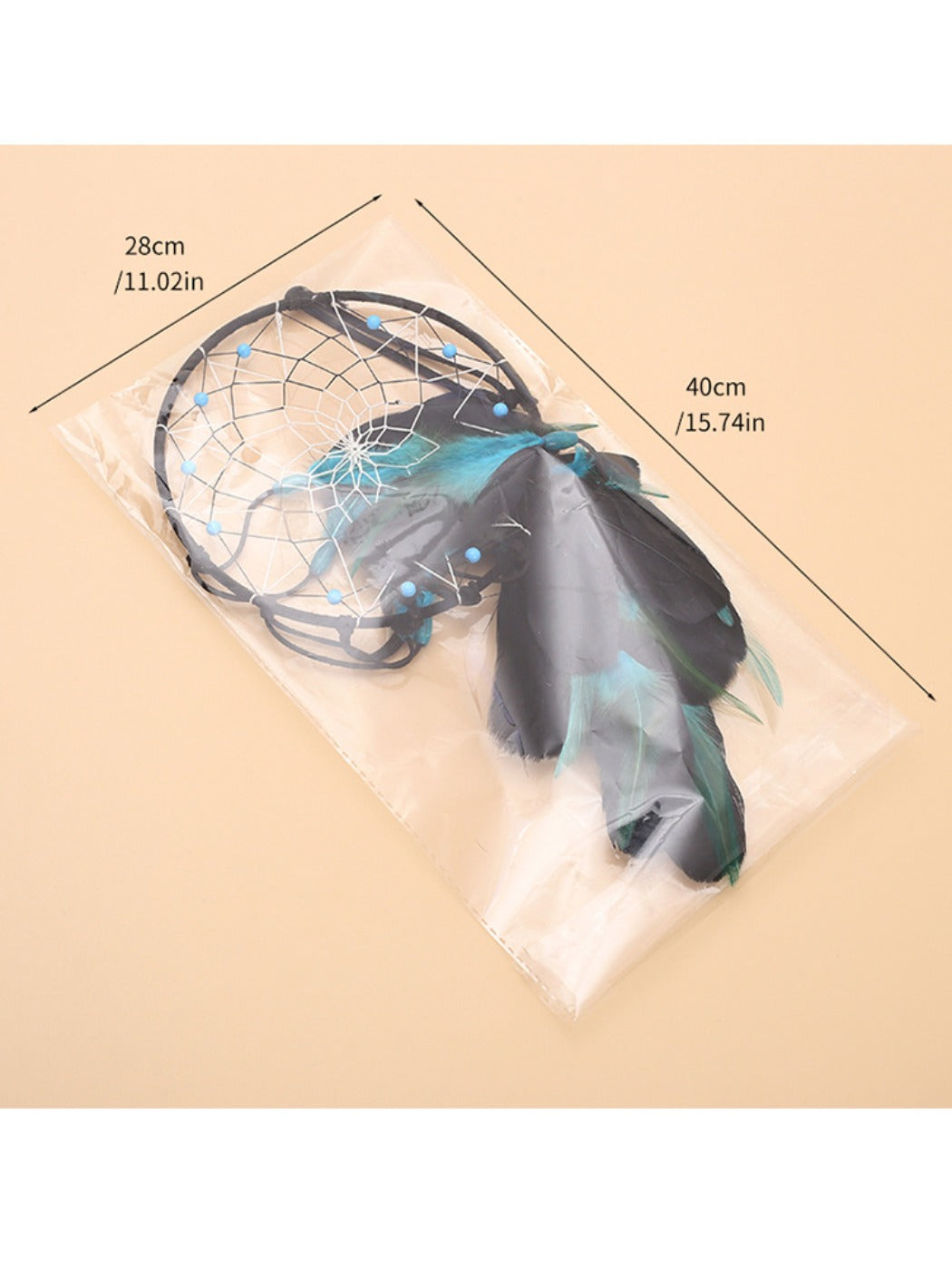 Decorative blue feather dreamcatcher wall hanging displayed indoors