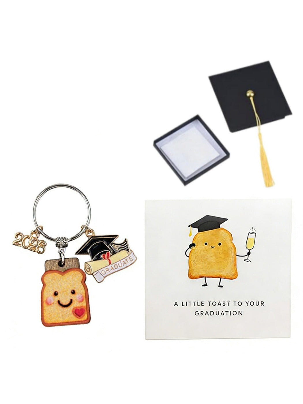 Taphug resin bread cookie charm on graduation keychain displayed on wooden surface