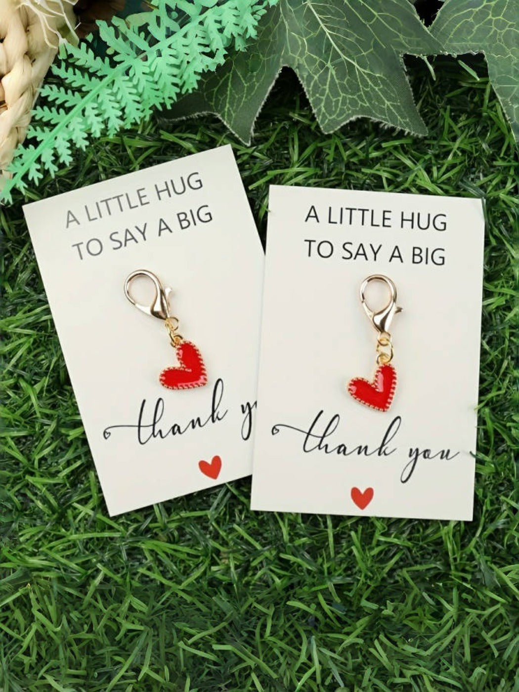 Close-up of Taphug Pocket Hug keychain showing colorful heart detail