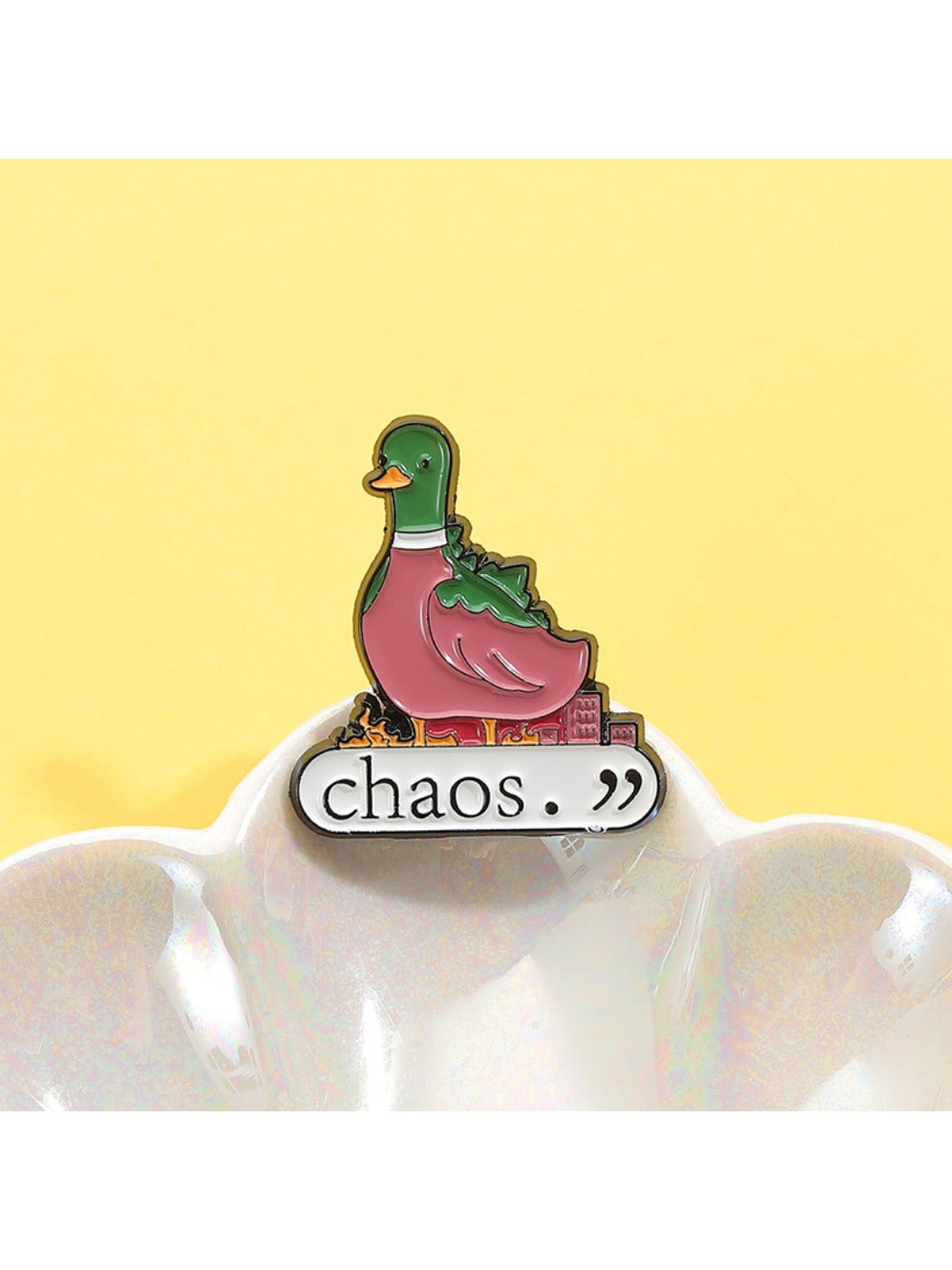 Pinori green duck brooch pinned on denim jacket pocket