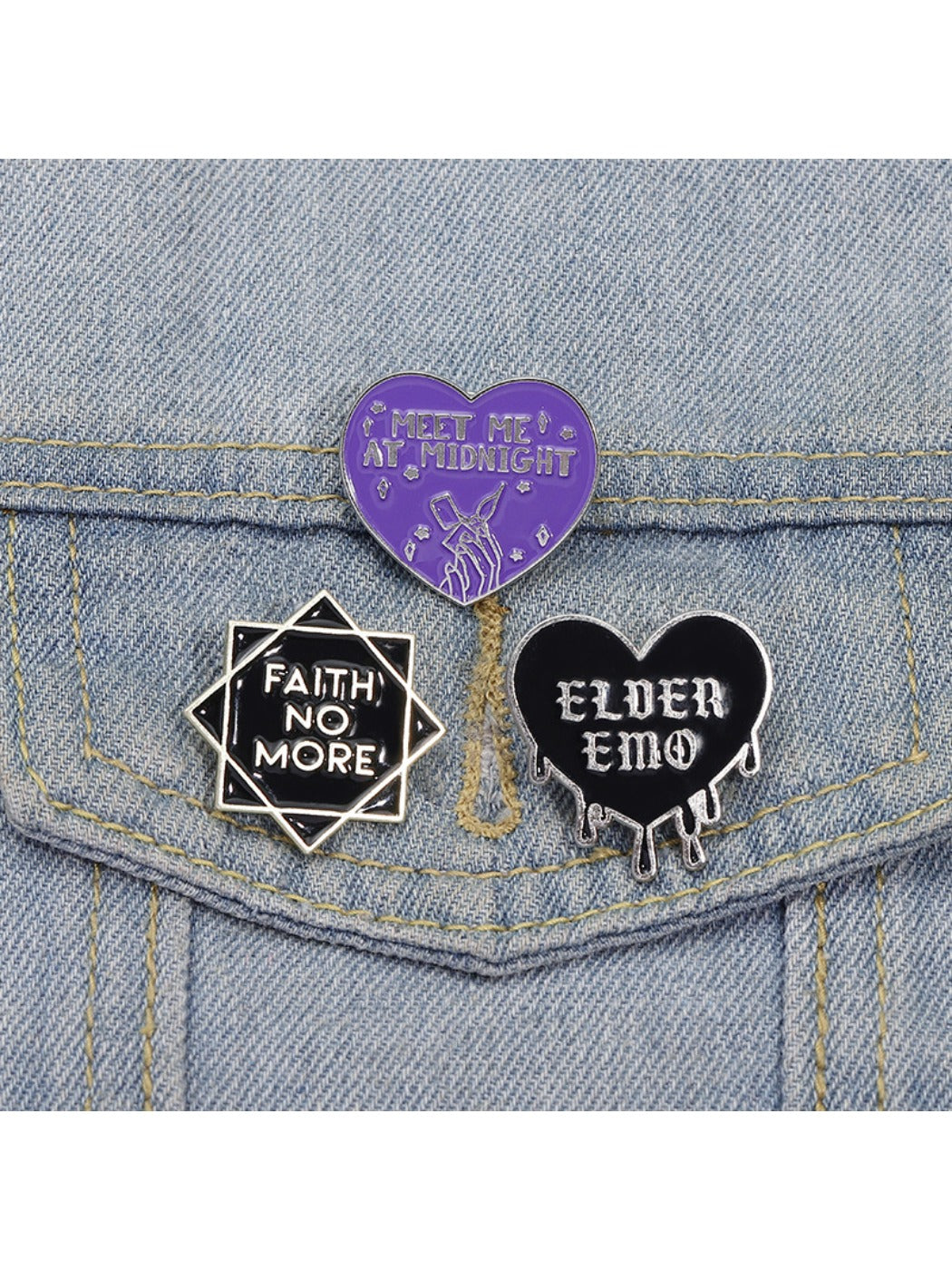 Side view of Pinori black heart badge highlighting thickness and metal clasp