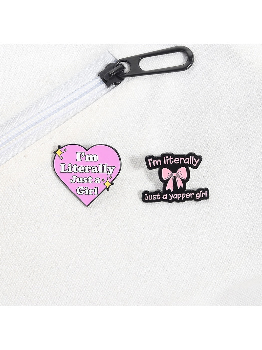 Detailed shot of the textured metal pin on Pinori pink bow brooch