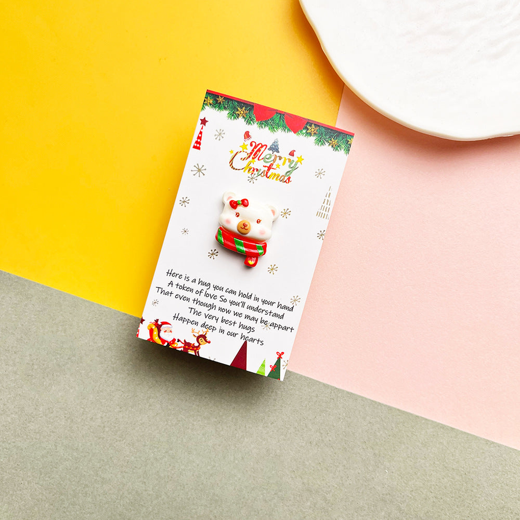White bear with striped scarf pocket hug on a Christmas message card